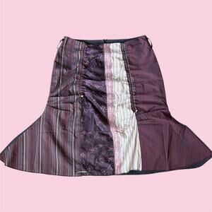 Des fille à la vanille 90’s patchwork midi skirt with floral embroidery
